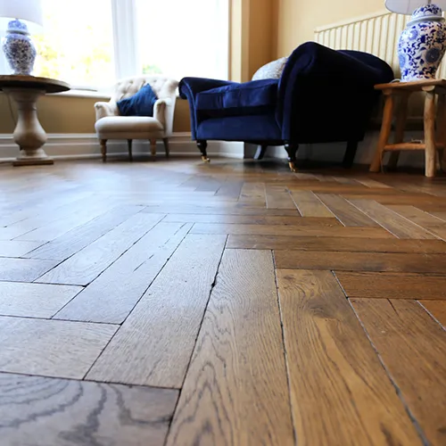 hardwood herringbone flooring in living room fitted by aj rogers and sons