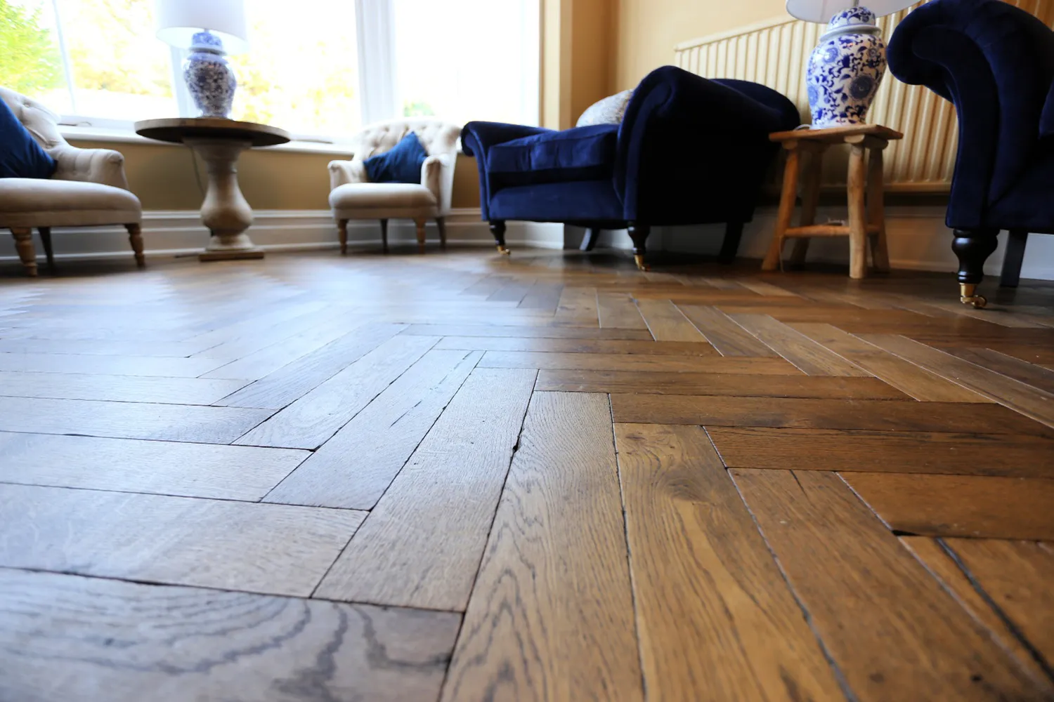 hardwood herringbone flooring in living room fitted by aj rogers and sons